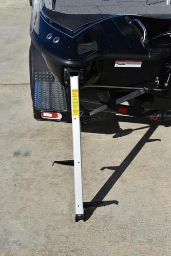 Slide: The Image of 2024 Triton 18 TrX boat trailer with support stand. - 27