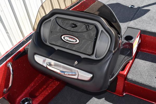 Slide: The Image of 2024 Triton 18 TrX boat console with windshield and storage compartment. - 33