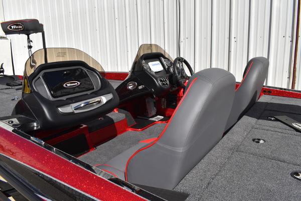 Slide: The Image of 2024 Triton 18 TrX boat interior with dual consoles and seating. - 35
