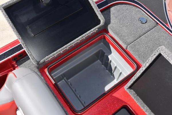 Slide: The Image of 2024 Triton 18 TrX boat storage compartments and seating area. - 45