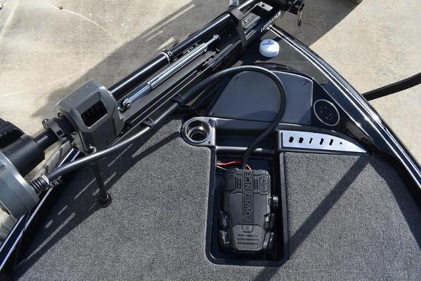 Slide: The Image of 2024 Triton 18 TrX boat dashboard with Lowrance electronics and trolling motor. - 8