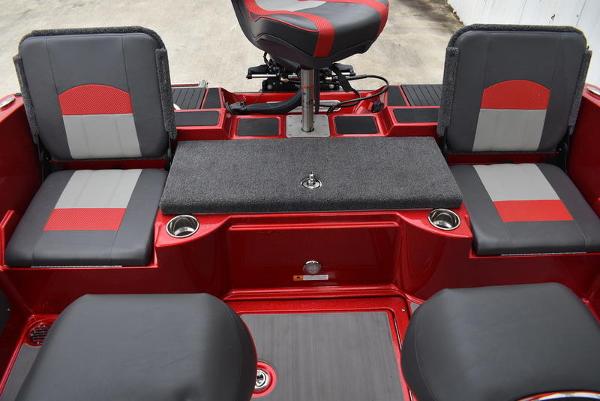 Slide: The Image of 2024 Triton 206 Allure boat interior with red and gray seating. - 31