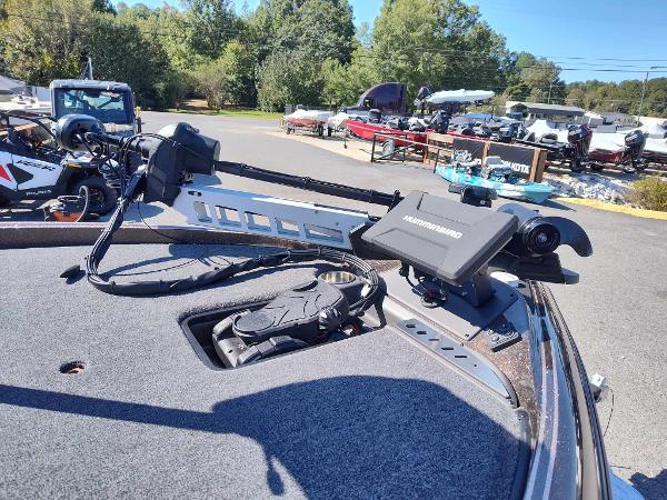 Slide: The Image of 2024 Triton 21 TrX boat with Humminbird electronics and trolling motor. - 6