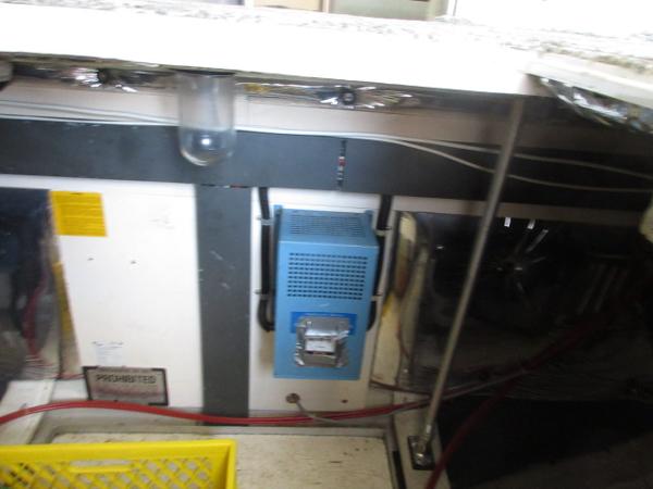 Slide: The Image of Engine compartment of a 1986 Trojan 11 Meter Convertible boat. - 29