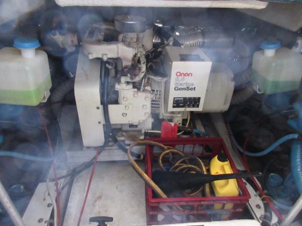 Slide: The Image of 1986 Trojan 11 Meter Convertible engine room with Onan Marine GenSet. - 32