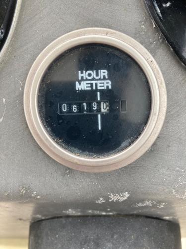 Slide: The Image of Hour meter of a 2003 Trophy 2052 Walkaround boat showing 619 hours. - 16