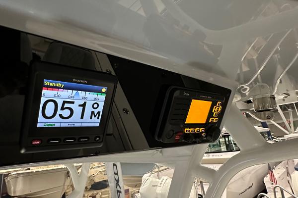 Slide: The Image of 2022 Valhalla V-33 Center Console with Garmin navigation display. - 13