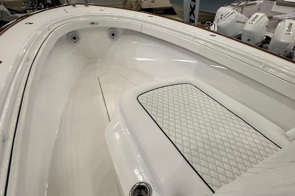 Slide: The Image of 2022 Valhalla V-33 Center Console boat interior with quilted seating and sleek design. - 22