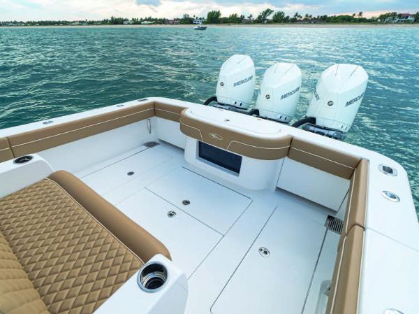 Slide: The Image of 2025 Valhalla Boatworks V-37 with triple Mercury outboard engines on the water. - 1