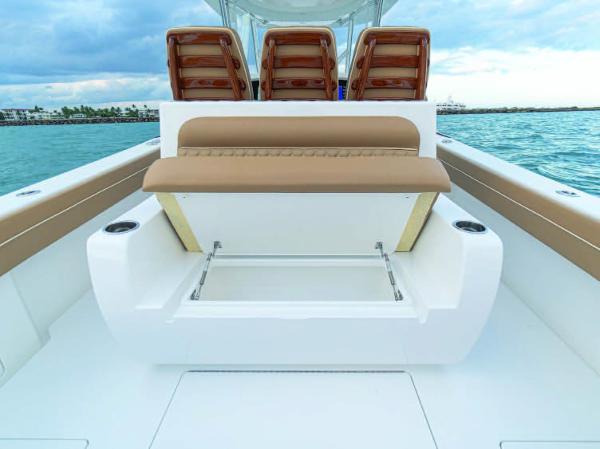 Slide: The Image of 2025 Valhalla Boatworks V-37 with tan seating and storage compartment. - 14