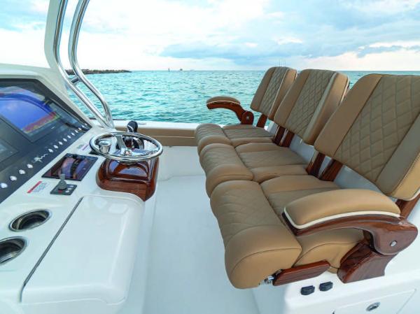 Slide: The Image of 2025 Valhalla Boatworks V-37 interior with luxurious seating and advanced navigation system. - 18