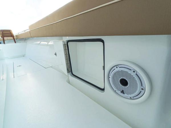 Slide: The Image of 2025 Valhalla Boatworks V-37 interior with storage compartment and speaker. - 22