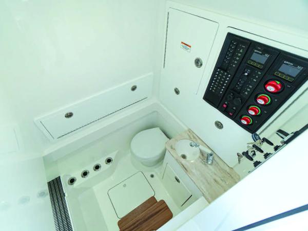 Slide: The Image of 2025 Valhalla Boatworks V-37 interior cabin with control panel and toilet. - 26