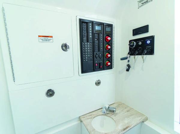 Slide: The Image of 2025 Valhalla Boatworks V-37 control panel and sink area. - 27