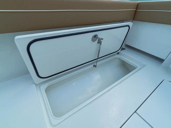 Slide: The Image of Open storage compartment on 2025 Valhalla Boatworks V-37 boat. - 3