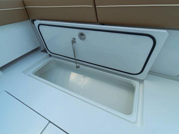 Slide: The Image of Open storage compartment on 2025 Valhalla Boatworks V-37 boat. - 4