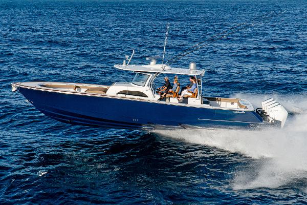 Slide: The Image of 2025 Valhalla Boatworks V-46 cruising on open water, showcasing sleek design and powerful performance. - 1