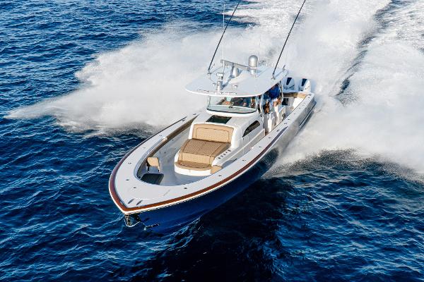 Slide: The Image of 2025 Valhalla Boatworks V-46 cruising on open water at high speed. - 2