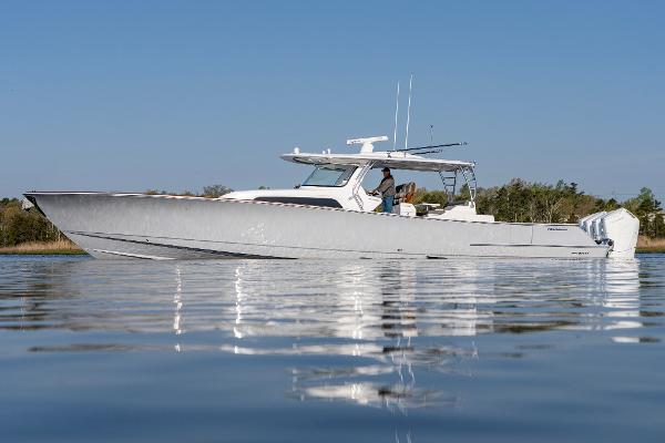 Slide: The Image of 2025 Valhalla Boatworks V-55 on calm water, side view. - 0