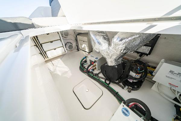 Slide: The Image of Engine compartment of 2025 Valhalla Boatworks V-55 boat with wiring and components. - 15