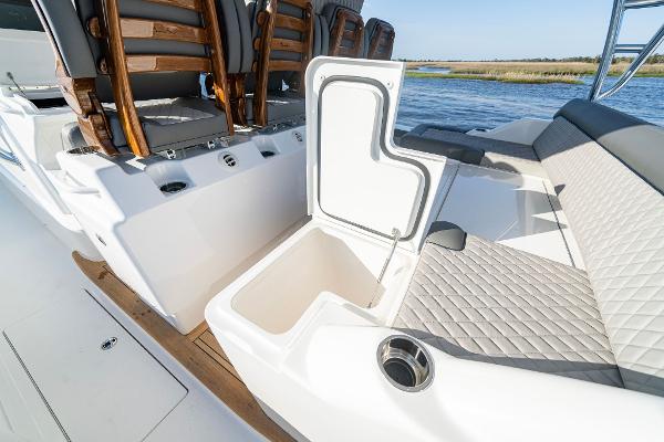 Slide: The Image of 2025 Valhalla Boatworks V-55 interior seating and storage compartment. - 16