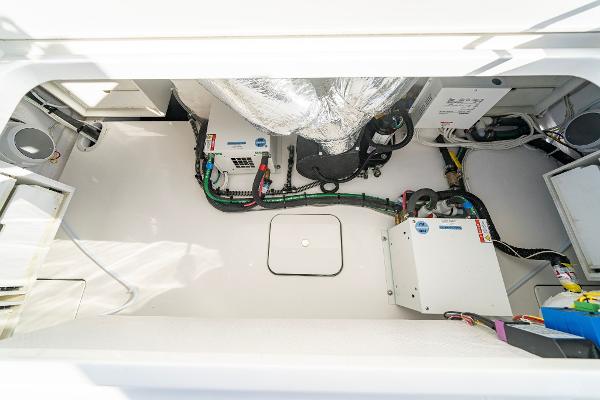 Slide: The Image of Engine room of 2025 Valhalla Boatworks V-55 with modern equipment and wiring. - 17