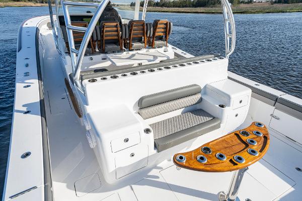 Slide: The Image of 2025 Valhalla Boatworks V-55 luxury fishing boat with seating and rod holders. - 6