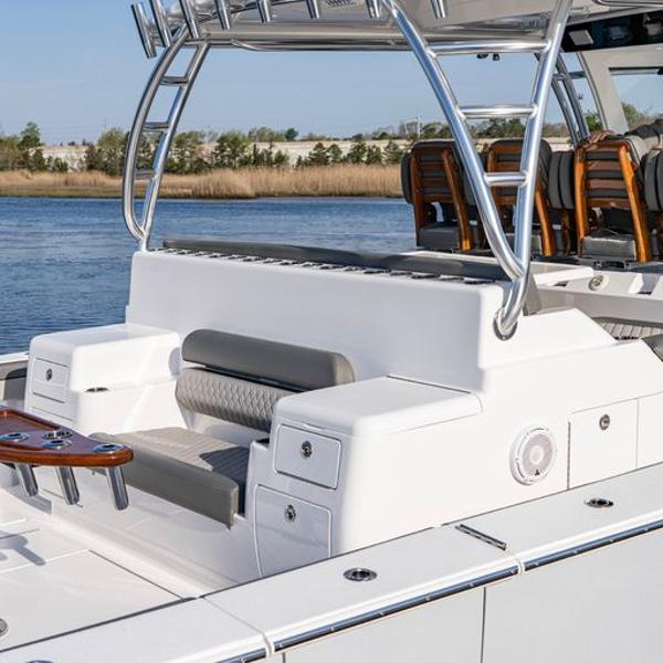 Slide: The Image of 2025 Valhalla Boatworks V-55 luxury boat with seating and storage compartments. - 7