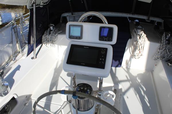 Slide: The Image of Valiant 42 sailboat cockpit with navigation instruments, 1996 model. - 18