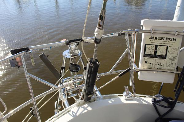 Slide: The Image of Close-up of the stern of a 1996 Valiant 42 sailboat with Lifesling equipment. - 19