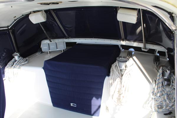 Slide: The Image of Interior of 1996 Valiant 42 sailboat with blue covers and ropes. - 24