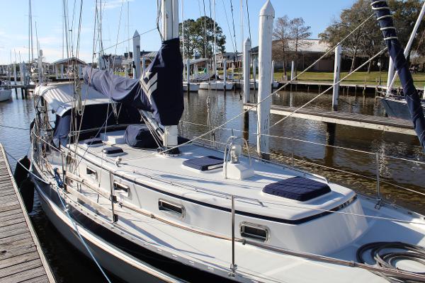 Slide: The Image of 1996 Valiant 42 sailboat docked at marina. - 5