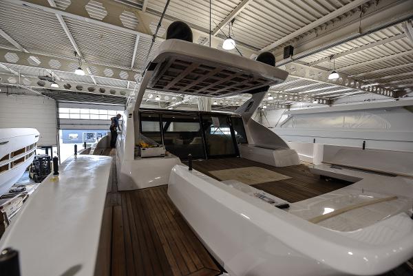 Slide: The Image of 2026 Van der Valk Beach Club 600 yacht interior in a showroom. - 30