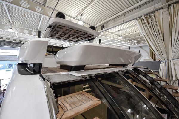 Slide: The Image of Van der Valk Beach Club 600 yacht, 2026 model, showcasing upper deck and modern design. - 32