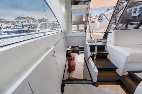 Slide: The Image of Interior of 2026 Van der Valk Beach Club 600 yacht with modern seating and stairs. - 40