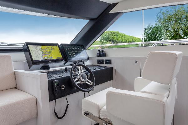 Slide: The Image of Modern helm station of the 2026 Van der Valk Beach Club 600 yacht. - 42