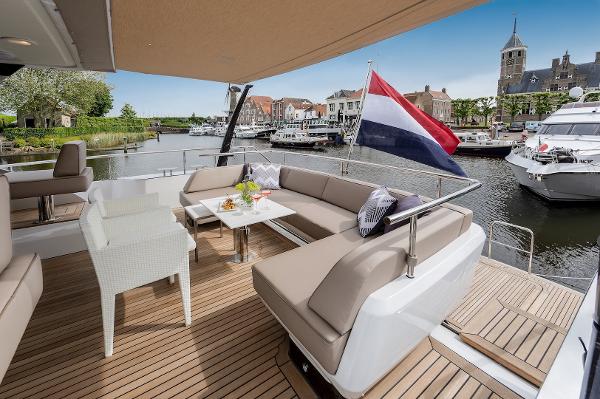 Slide: The Image of Luxurious deck of 2026 Van der Valk Beach Club 600 yacht in a scenic marina. - 48