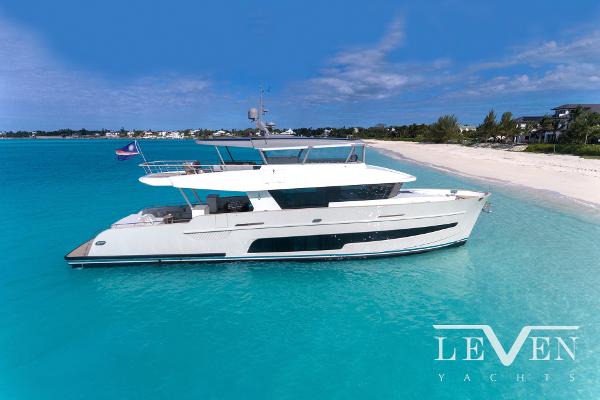 Slide: The Image of Luxury Van der Valk LeVen 90 yacht, 2026 model, anchored near a pristine beach. - 1