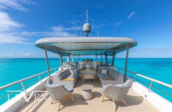 Slide: The Image of Luxurious Van der Valk LeVen 90 yacht deck, 2026 model, with ocean view and elegant seating. - 10