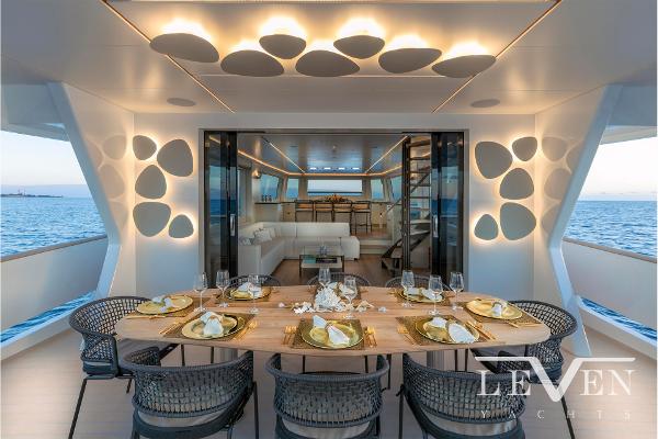 Slide: The Image of Luxurious Van der Valk LeVen 90 yacht dining area with elegant table setting, 2026 model. - 17