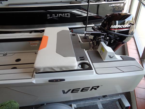 Slide: The Image of 2023 Veer V13 boat with Mercury outboard motor in showroom. - 1