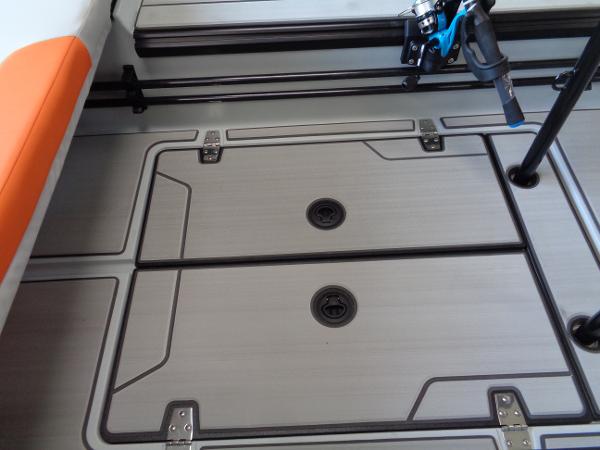 Slide: The Image of Veer V13 2023 model boat deck with storage compartments and fishing rod holder. - 11