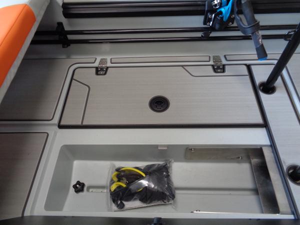 Slide: The Image of Veer V13 2023 model boat interior storage compartment with accessories. - 8