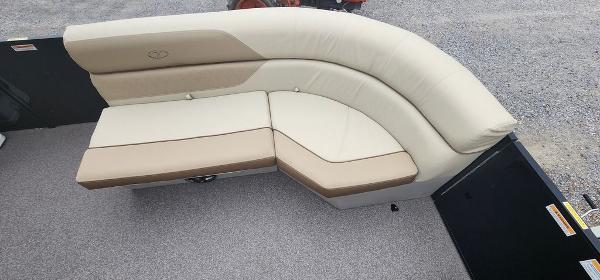 Slide: The Image of 2023 Veranda VISTA20RC Bi-Toon boat with beige and tan cushioned seating. - 11