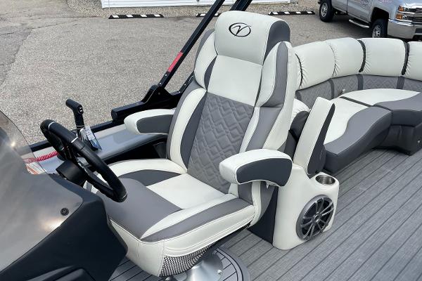 Slide: The Image of 2024 Veranda VP 22RC boat interior with luxurious captain's chair and spacious seating. - 4