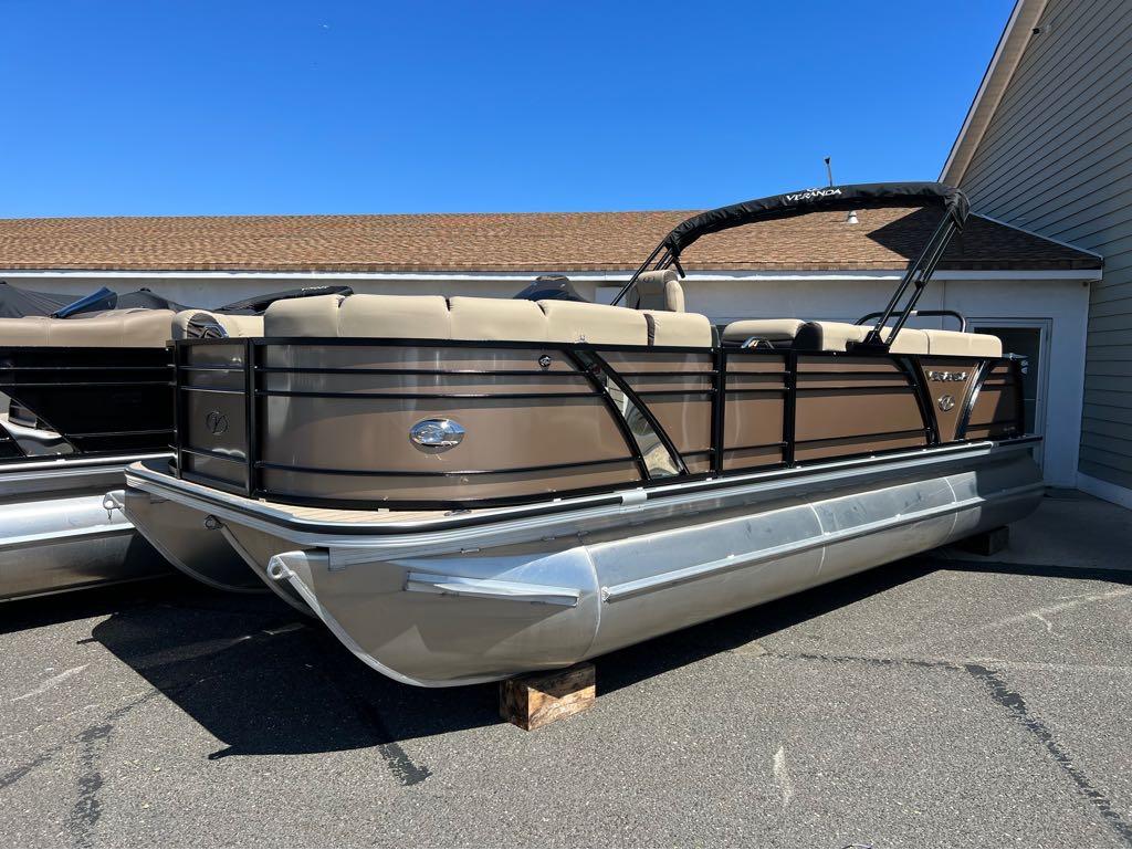 Slide: The Image of 2023 Veranda VP 22 VLB pontoon boat in a parking lot. - 13