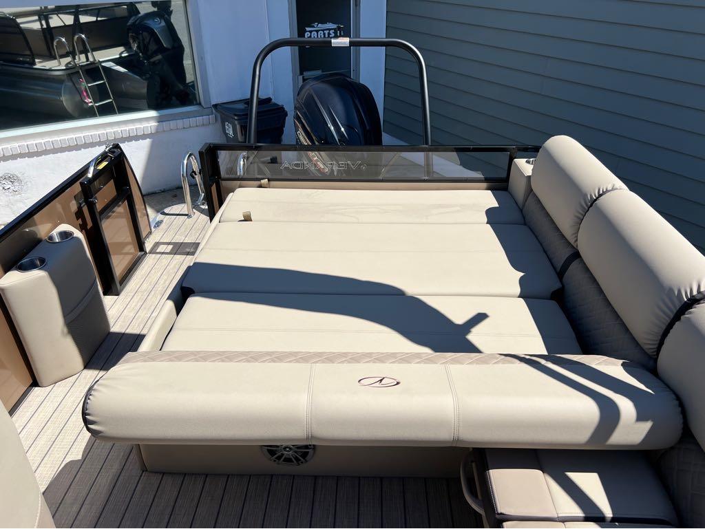 Slide: The Image of 2023 Veranda VP 22 VLB pontoon boat with beige seating and spacious deck. - 19