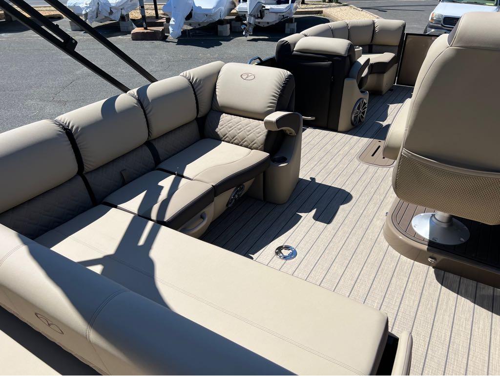 Slide: The Image of 2023 Veranda VP 22 VLB pontoon boat interior with beige seating and spacious layout. - 24