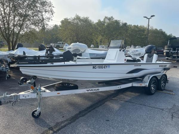 Slide: The Image of 2022 Vexus 1980 CC boat on trailer in parking lot. - 0