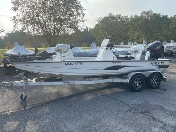 Slide: The Image of 2022 Vexus 1980 CC boat on trailer in outdoor setting. - 4